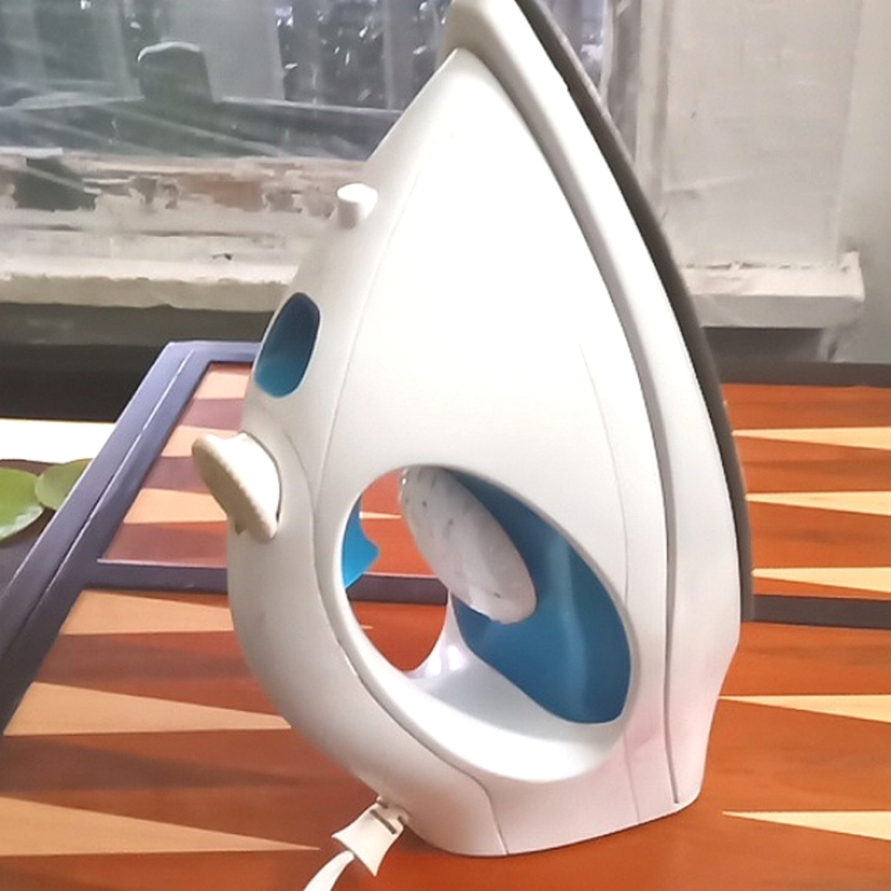 Westinghouse steam clothes iron .